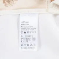 Load image into Gallery viewer, MILKBARN - Seashells Long Sleeve Pocket Bib